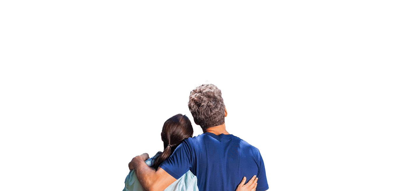 Two people hugging, view from behind