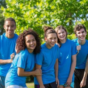 Teens in blue shirts in a group