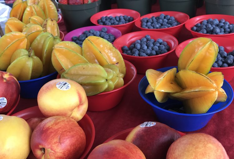 Farmers Market table with fruit and vegetables, Ave Maria Florida