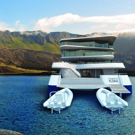 The Galapagos with small cruise ship on water