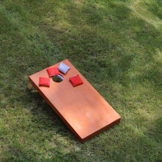 Bean Bag Toss Corn Hole Game red bags and wood platform Ave Maria, Florida