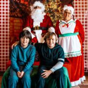 Two young boys with Santa photo