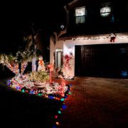 Home decorated with many Christmas lights