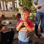 Young boy eating smore in Ave Maria, Florida