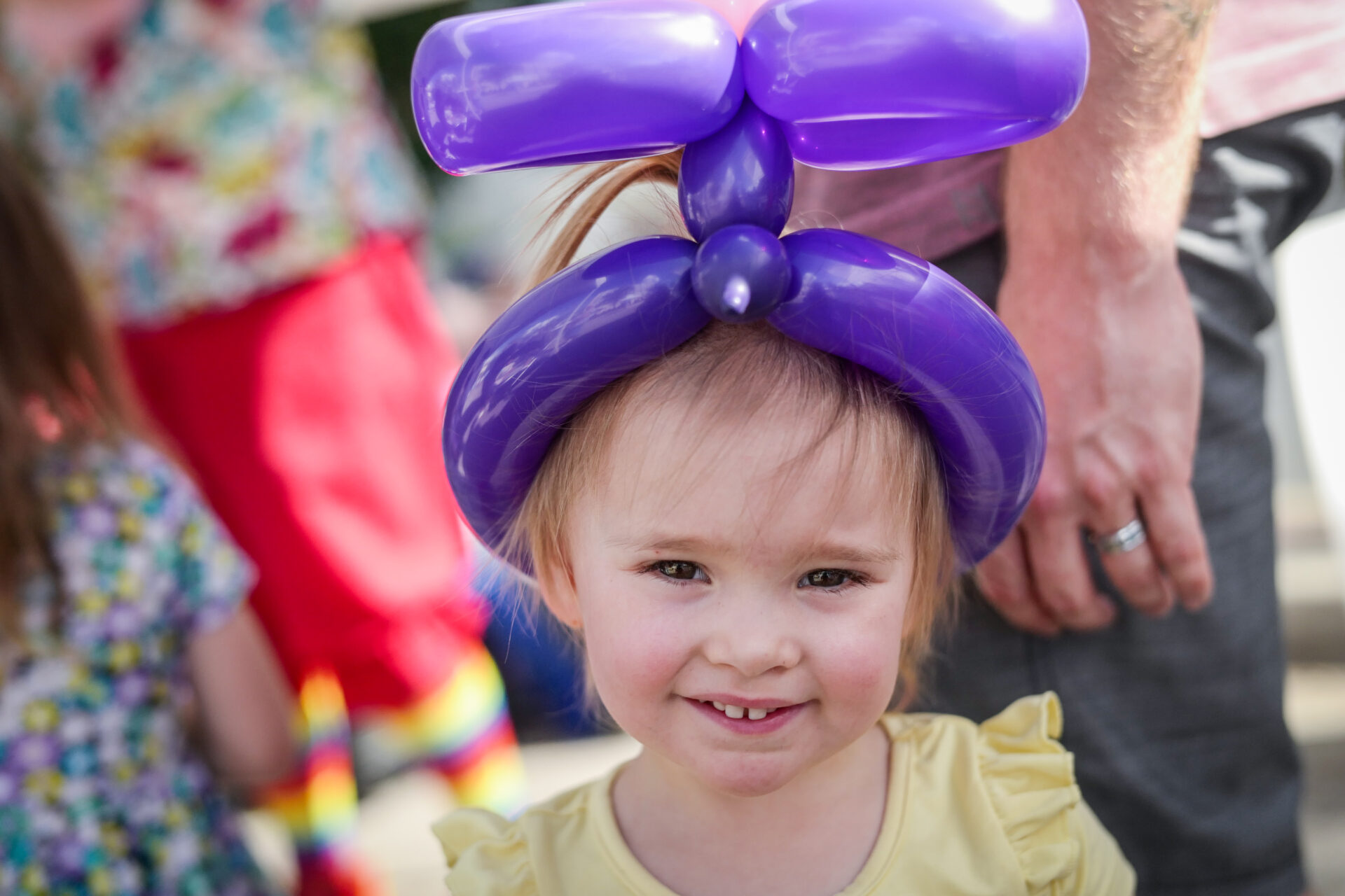 Girl with balloon hat