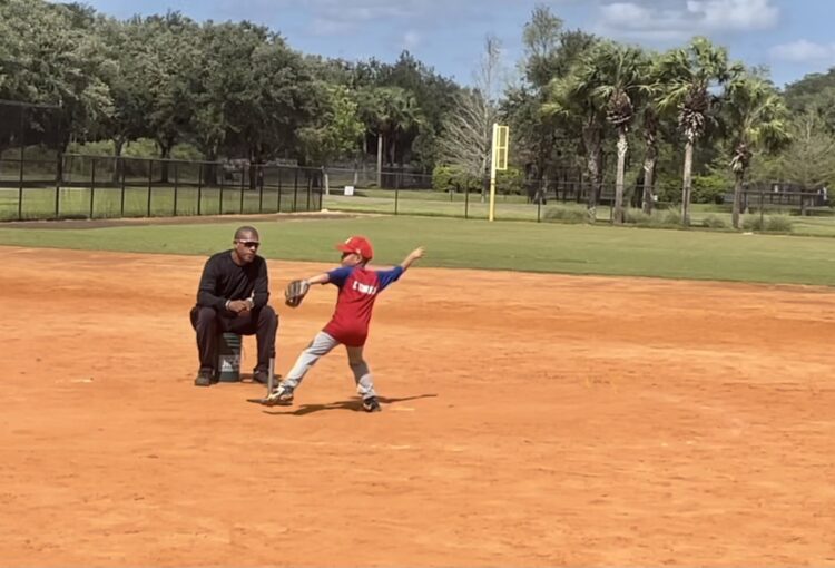 Former MLB Player "Manzy" plays ball with young pitcher