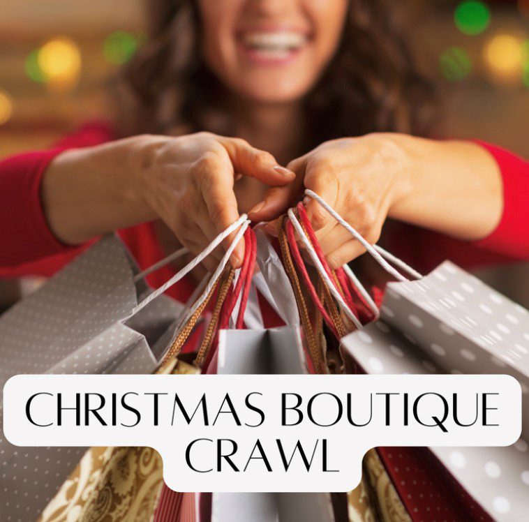 Shopper holding up gift bags with caption "Christmas Boutique Crawl"