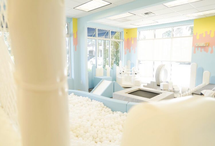 View of indoor kids play space activity room in Ave Maria, FL
