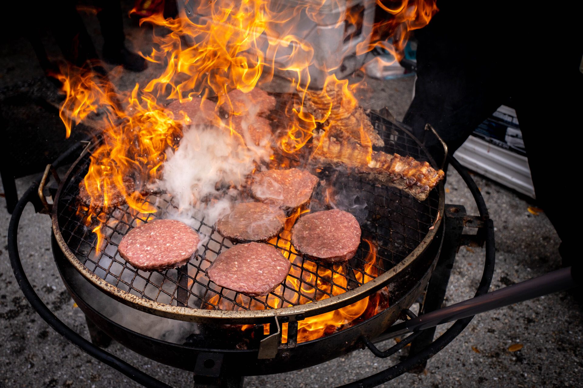 Grill with hamburgers and ribs