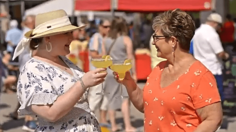 Mom and daughter cheers with margaritas