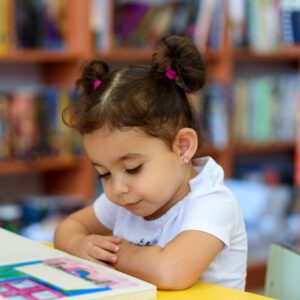 Child reads a book