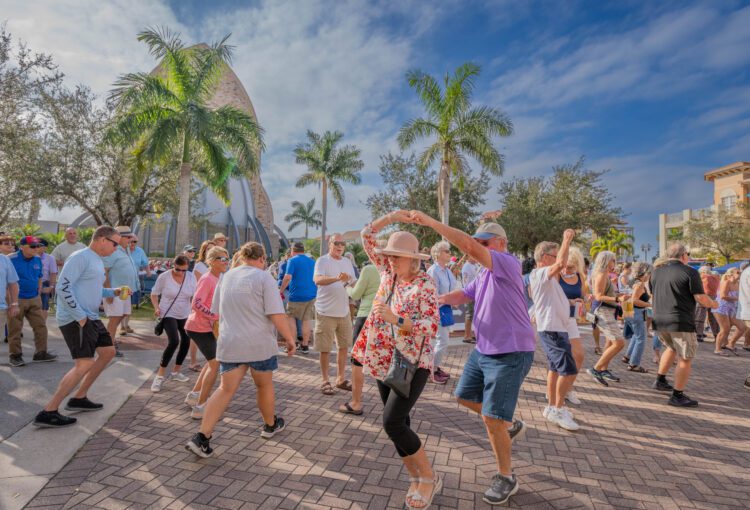 Ave Maria, FL event attendees dancing in the Town Center