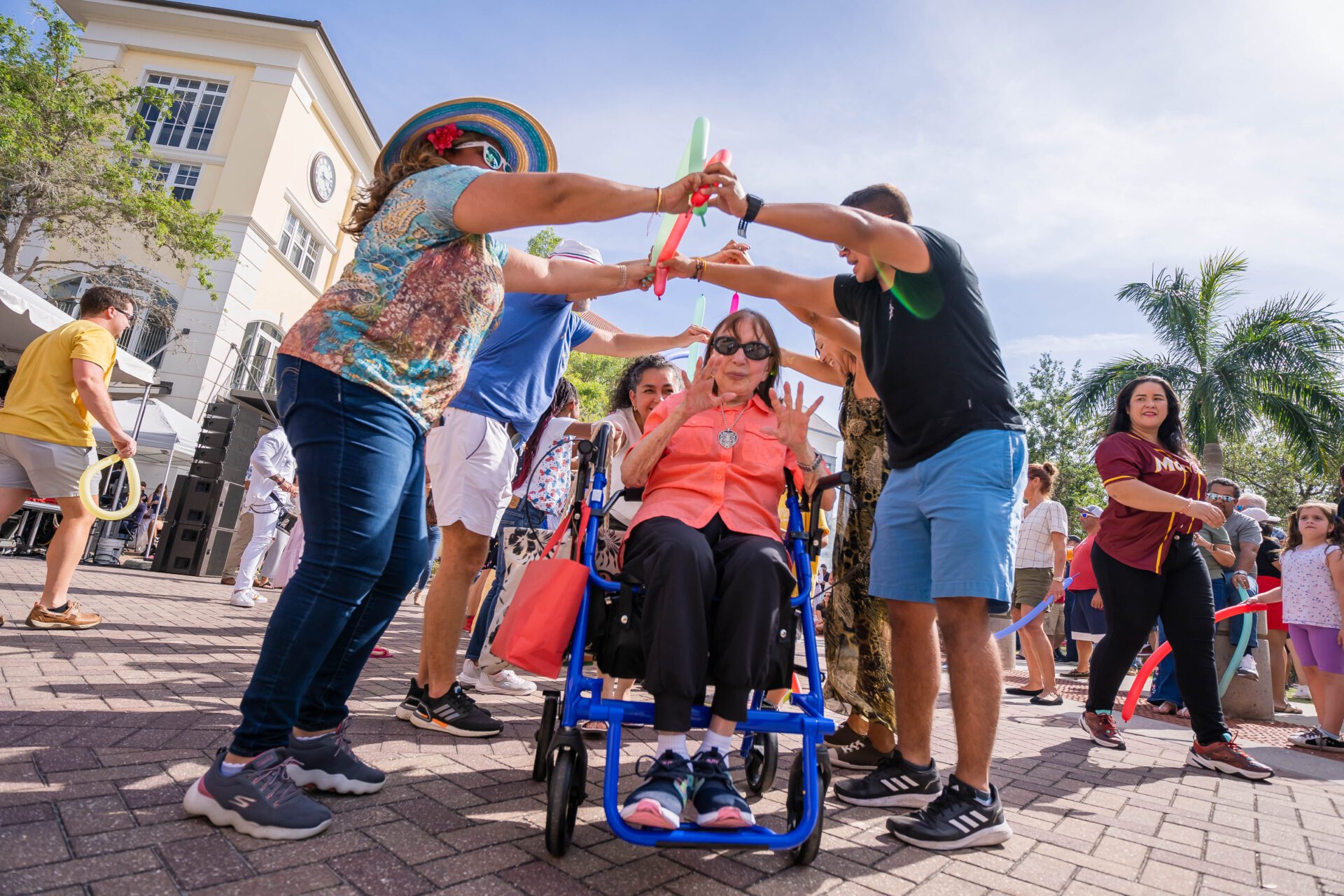 2023 Ave Maria Margarita & Taco Festival attendees dance in the Town Center