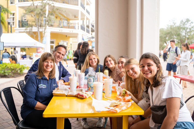 Family dines at Tropical Smoothie at 2023 Taste of Ave