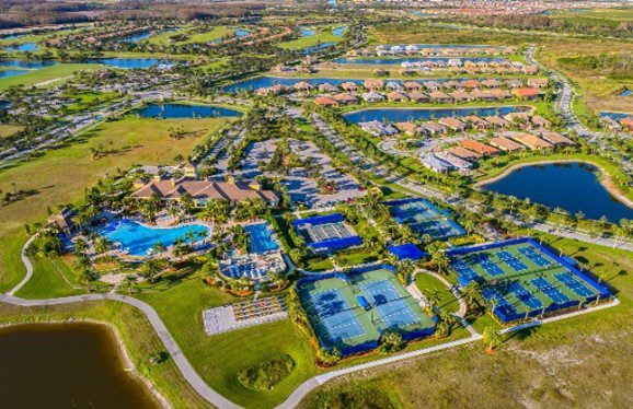 Aerial of Del Webb Naples amenity campus including the Club at Oasis and the Del Webb club house