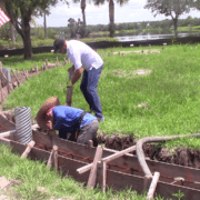 Workers working at work site of Ave Maria Veterans Memorial