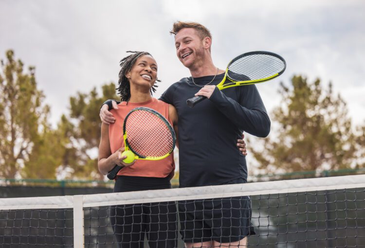 A couple playing mixed doubles