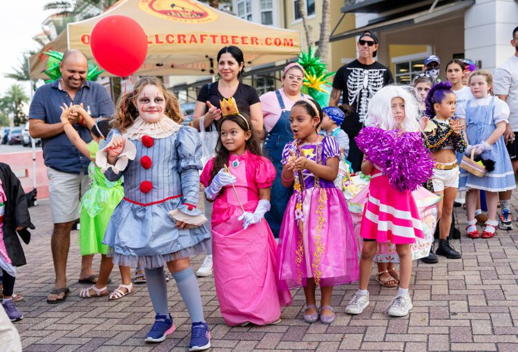 Children and tweens line up for judging for costume contest